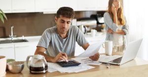 Couple reviewing their budget while comparing mortgage options
