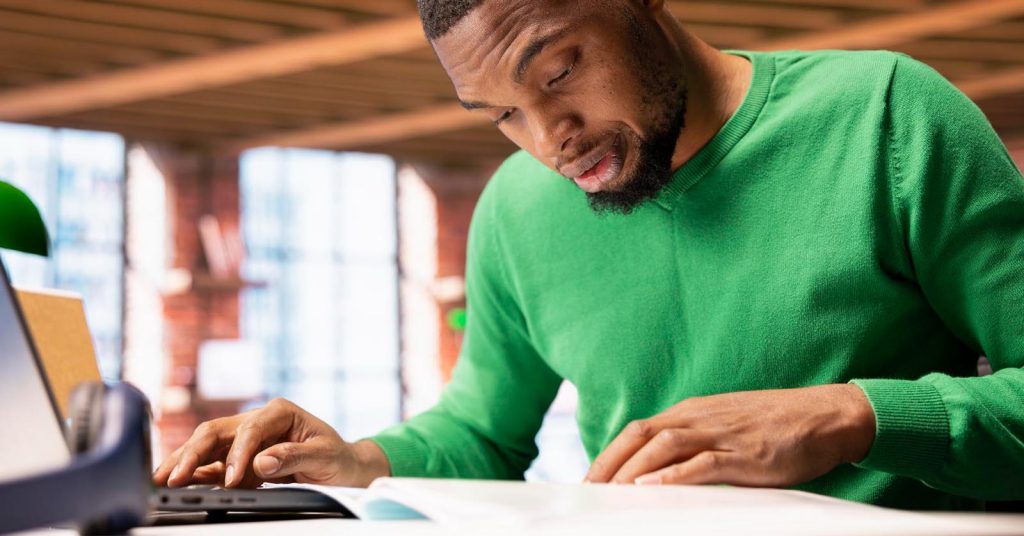 Homeowner reviewing mortgage costs and break-even calculations at home