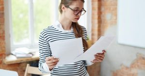 Student reviewing federal and private student loan options