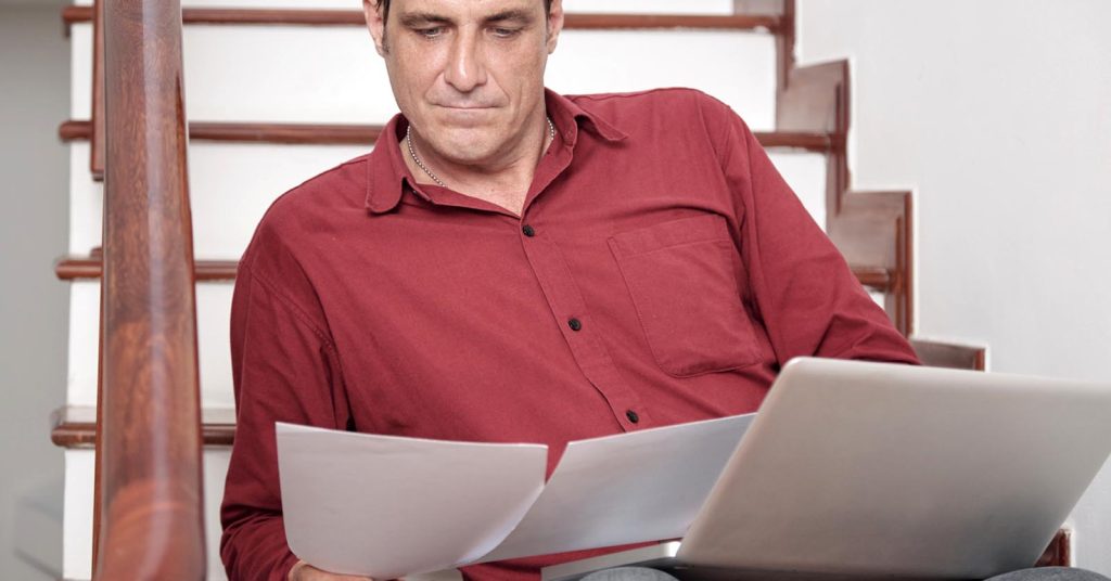 Man reviewing which property may be protected by bankruptcy exemptions