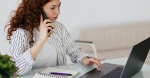 Woman contacting an insurer about an unexpected ground ambulance bill