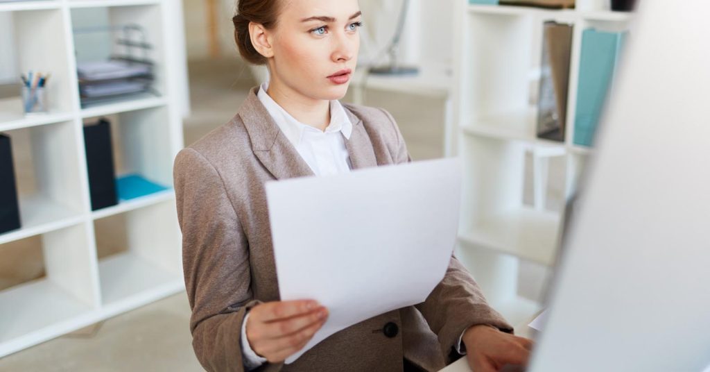 Estate representative reviewing medical bills after a family member’s death