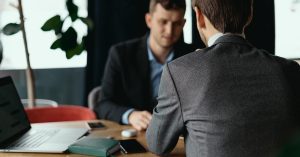 Employee discussing a raise and career progression with a manager
