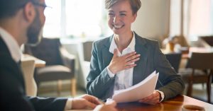 Employee discussing a promotion and career advancement with a manager