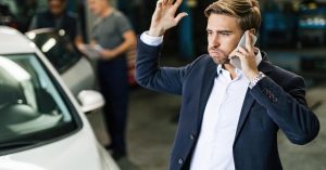 Driver arranging temporary transportation while his car is being repaired
