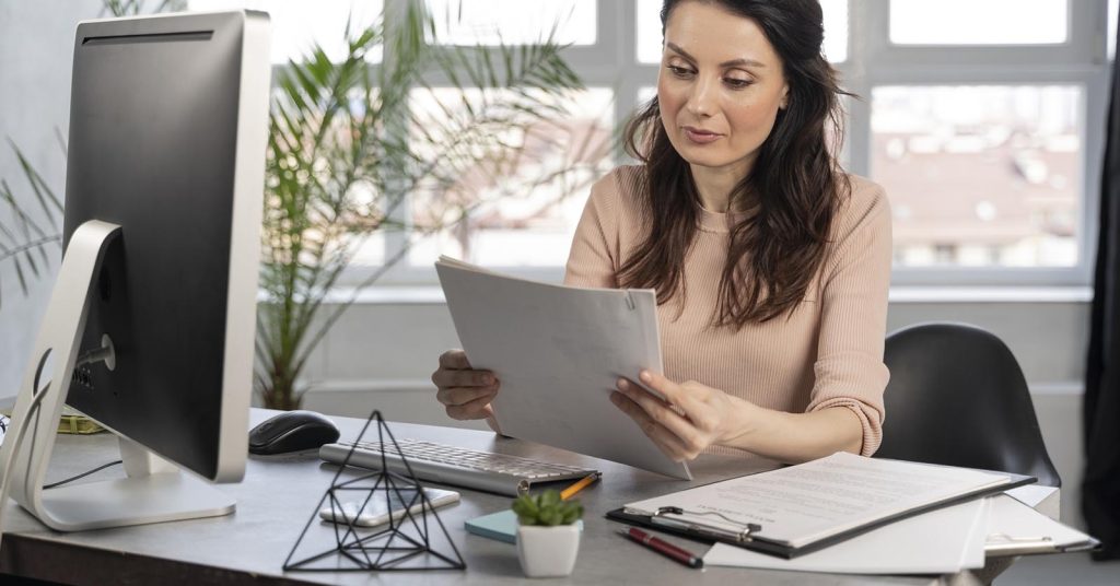 Woman reviewing documents